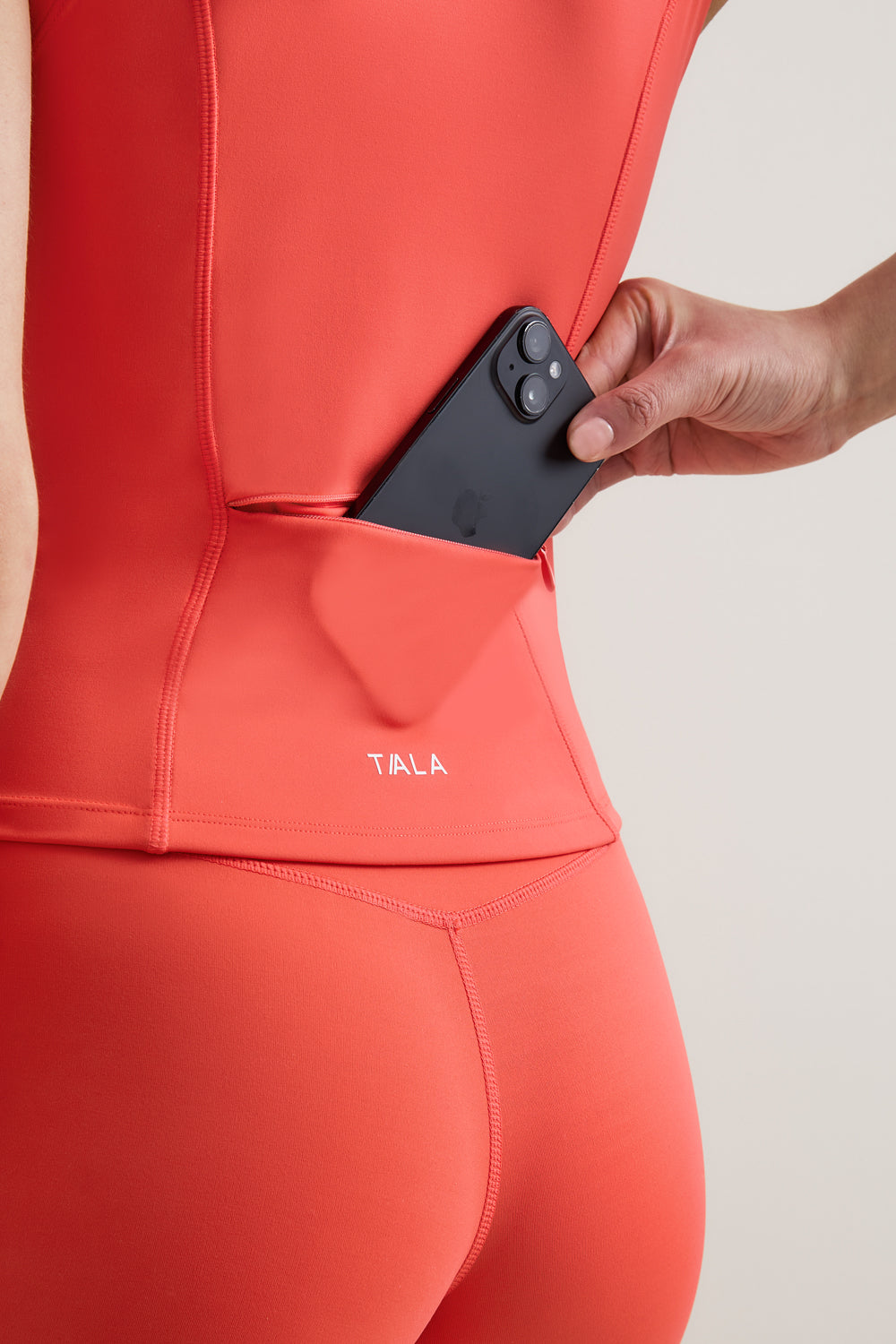 SkinLuxe Sleeveless Zip Through Running Top - Coral