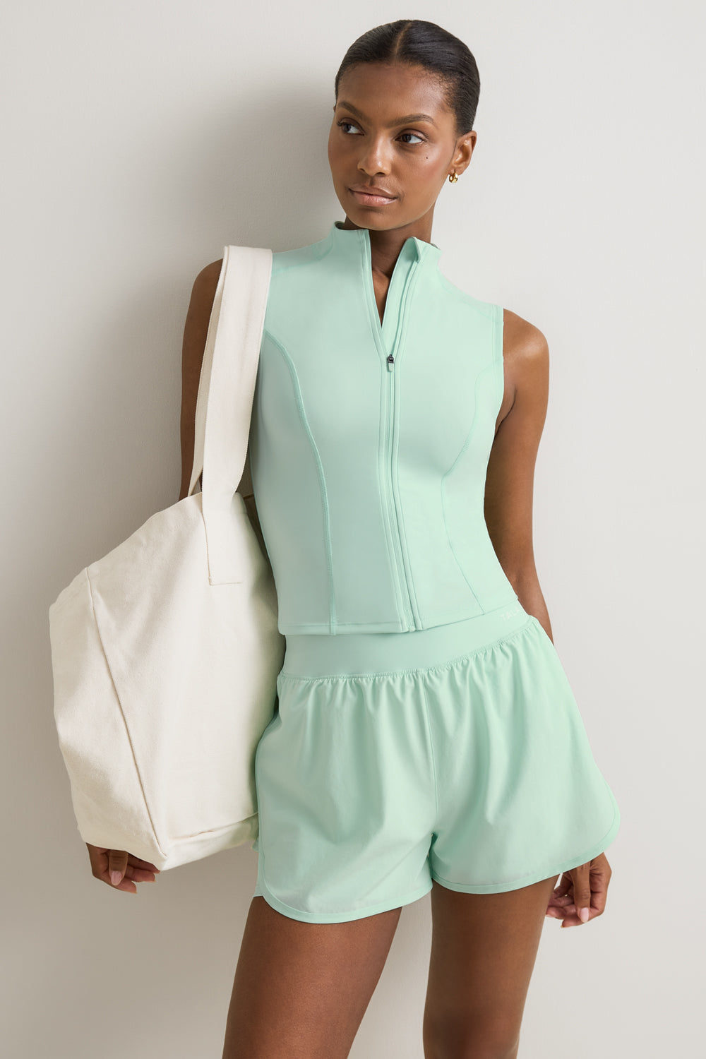 SkinLuxe Sleeveless Zip Through Running Top - Soft Mint