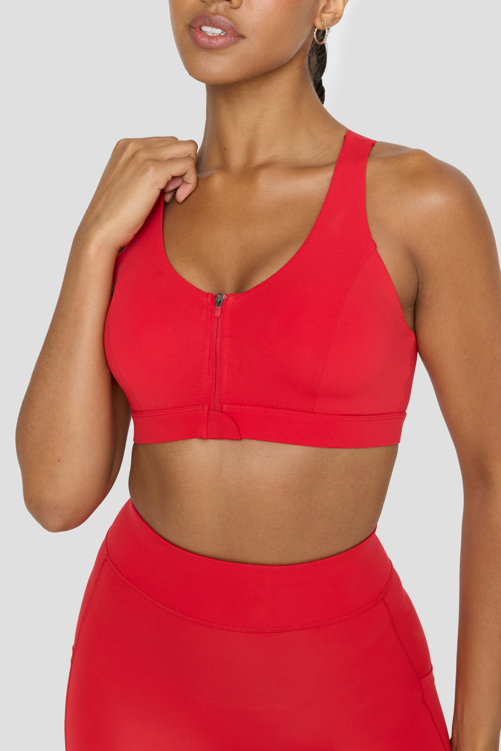 front of FormTech Zip Front Open Back Sports Bra in Chilli Red