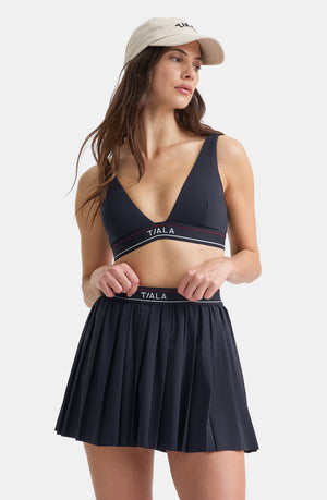 DAYFLEX LOGO PLEATED SKORT - MIDNIGHT NAVY