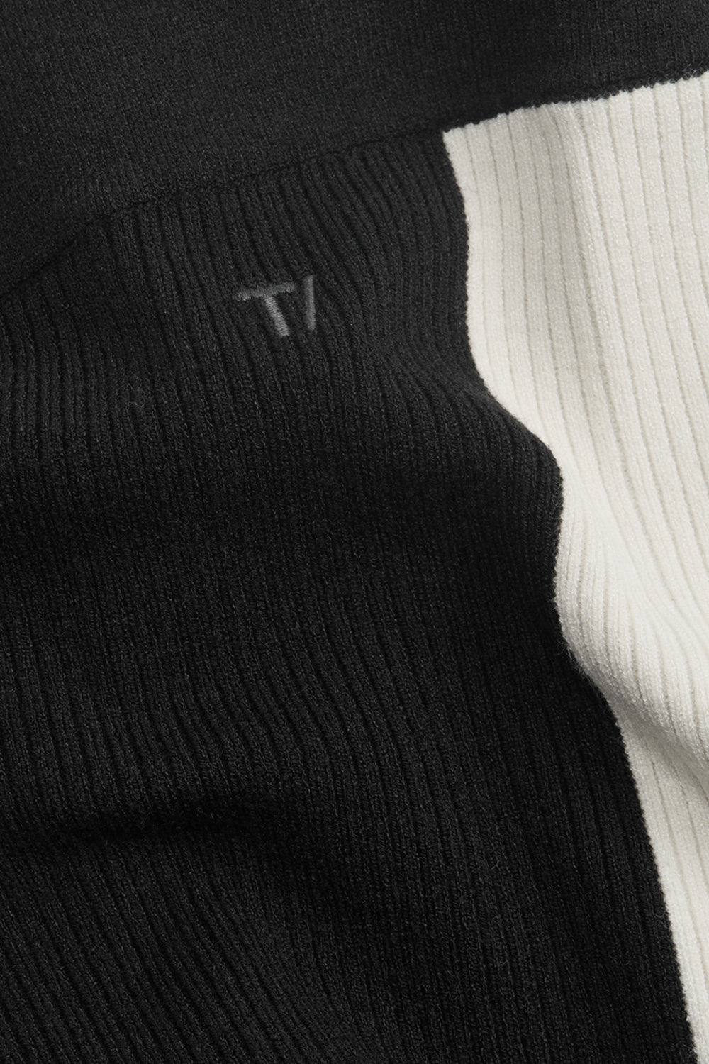 WIDE LEG CONTRAST RIBBED KNIT TROUSERS - BLACK AND BUTTERMILK