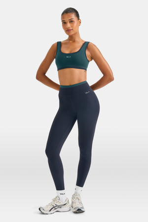 SkinLuxe Contrast Edge Sports Bra - Rich Teal / Midnight Navy