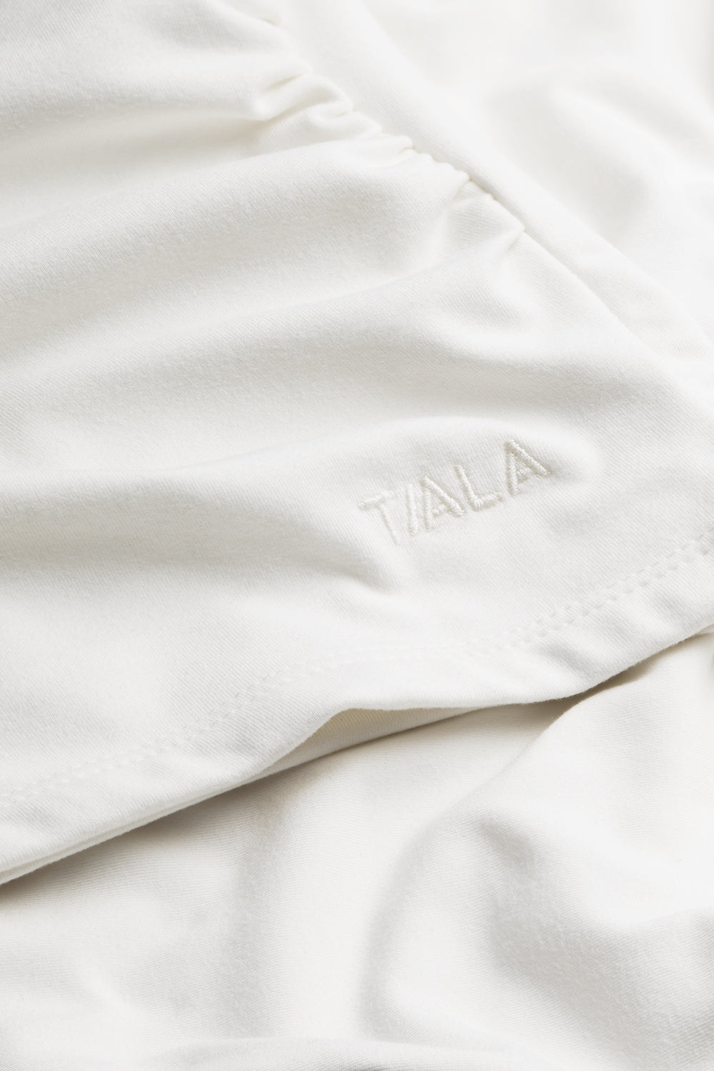 365 Asymmetric Ruched Long Sleeve Top - Coconut Milk